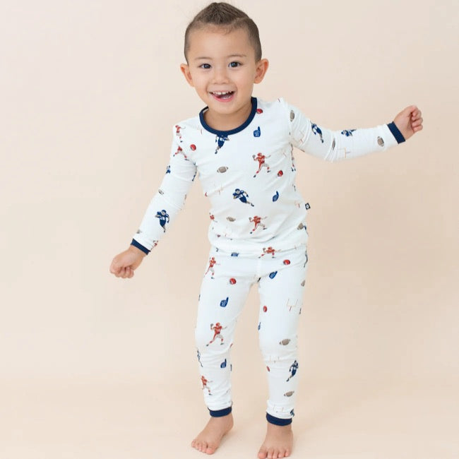 Kyte Baby Long Sleeve Pajamas in Football Football 5T